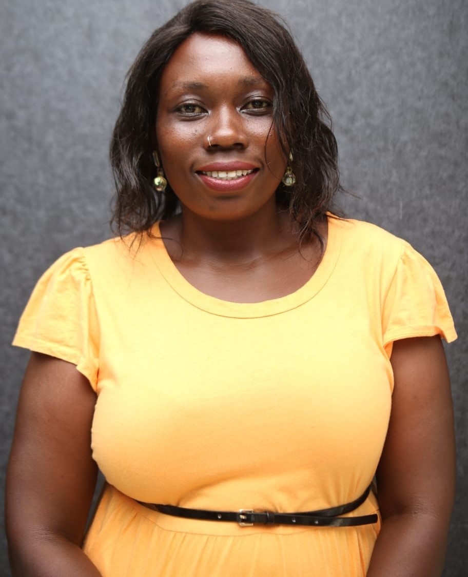 Akinyi Francis Posing for a photo